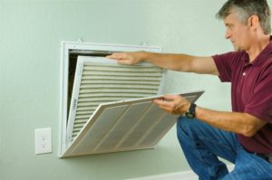 Man Opening Air Vent
